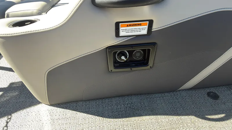 Slide: The Image of Interior of a 2025 Barletta C22U boat with warning label. - 34