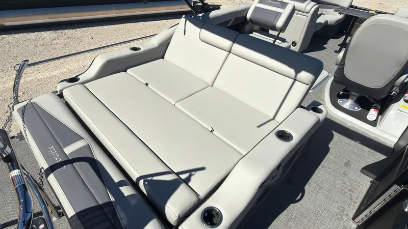 Slide: The Image of Interior of a 2025 Barletta C22U boat with gray seating. - 28