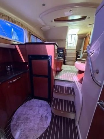 Slide: The Image of Interior of 2005 Sea Ray 390 Motor Yacht with modern amenities. - 14