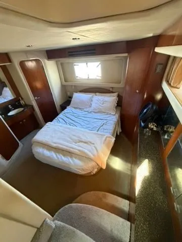 Slide: The Image of Interior of 2005 Sea Ray 390 Motor Yacht, cozy bedroom. - 16