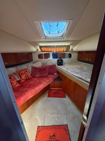Slide: The Image of Interior of 2005 Sea Ray 390 Motor Yacht with cozy seating area. - 20