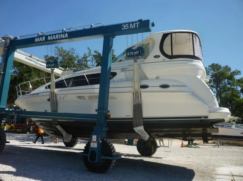Slide: The Image of 2005 Sea Ray 390 Motor Yacht in a marina lift at Mar Marina. - 5