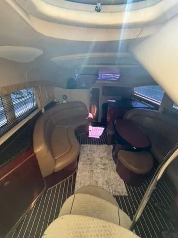 Slide: The Image of Interior of 2005 Sea Ray 390 Motor Yacht with elegant leather seating. - 8