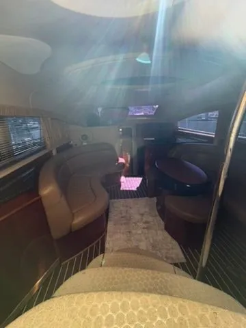 Slide: The Image of Interior of a 2005 Sea Ray 390 Motor Yacht with leather seating. - 9