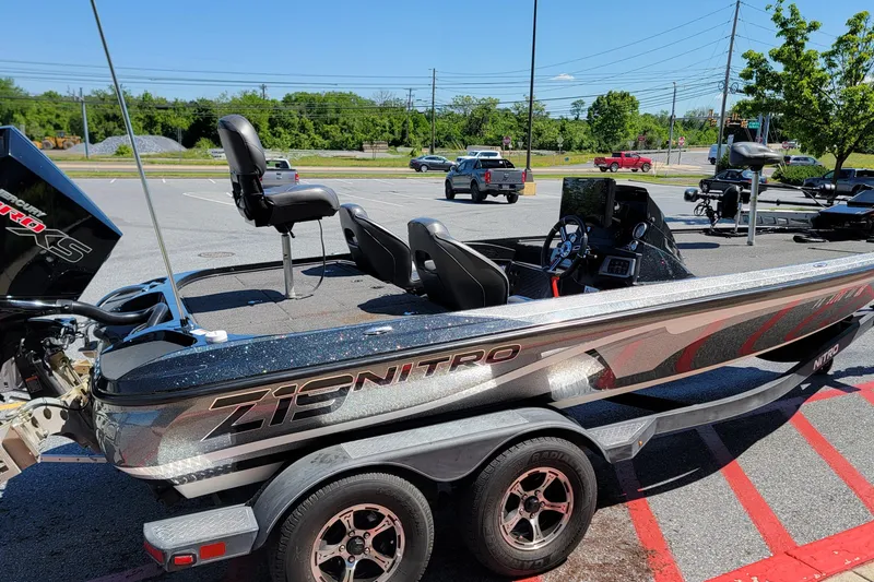 Slide: The Image of 2020 Nitro Z19 Pro boat parked on trailer in sunny parking lot. - 12