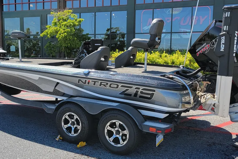 Slide: The Image of 2020 Nitro Z19 Pro boat on trailer, parked outside a showroom. - 3