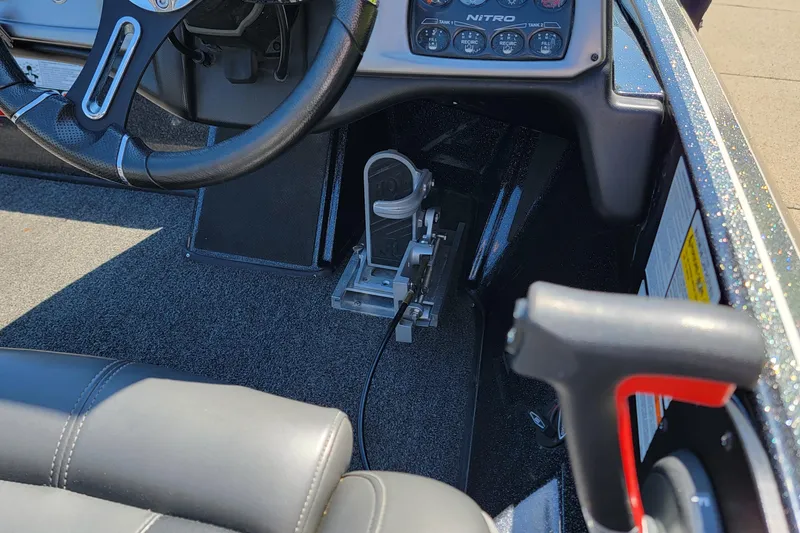 Slide: The Image of Interior of a 2020 Nitro Z19 Pro boat showing steering wheel and controls. - 6