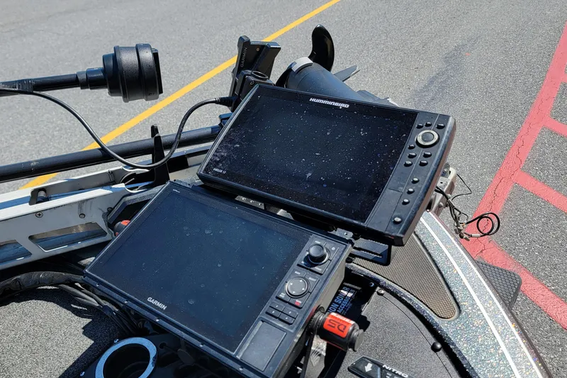 Slide: The Image of Fishing boat electronics on a 2020 Nitro Z19 Pro, featuring Garmin and Humminbird displays. - 8