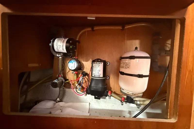 Slide: The Image of Electrical components inside a 2003 Jeanneau Sun Odyssey 37 yacht. - 105