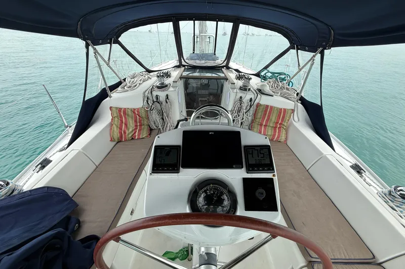 Slide: The Image of Cockpit view of 2003 Jeanneau Sun Odyssey 37 sailboat with navigation instruments. - 11