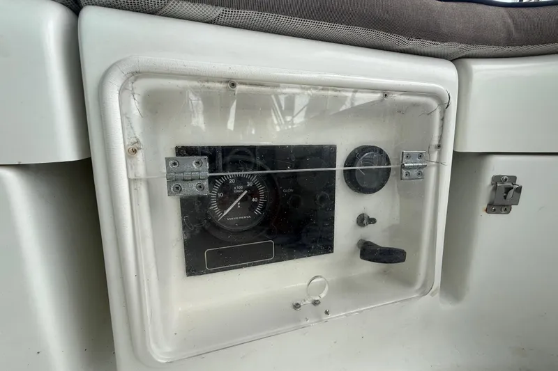 Slide: The Image of Instrument panel of a 2003 Jeanneau Sun Odyssey 37 sailboat, featuring gauges and controls. - 19