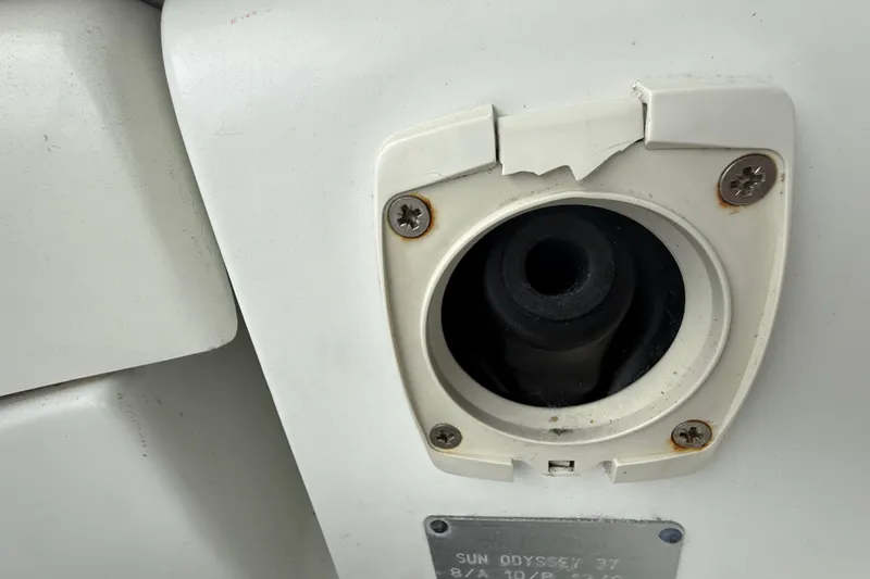 Slide: The Image of Close-up of a Jeanneau Sun Odyssey 37 boat component, showing a damaged socket. - 20