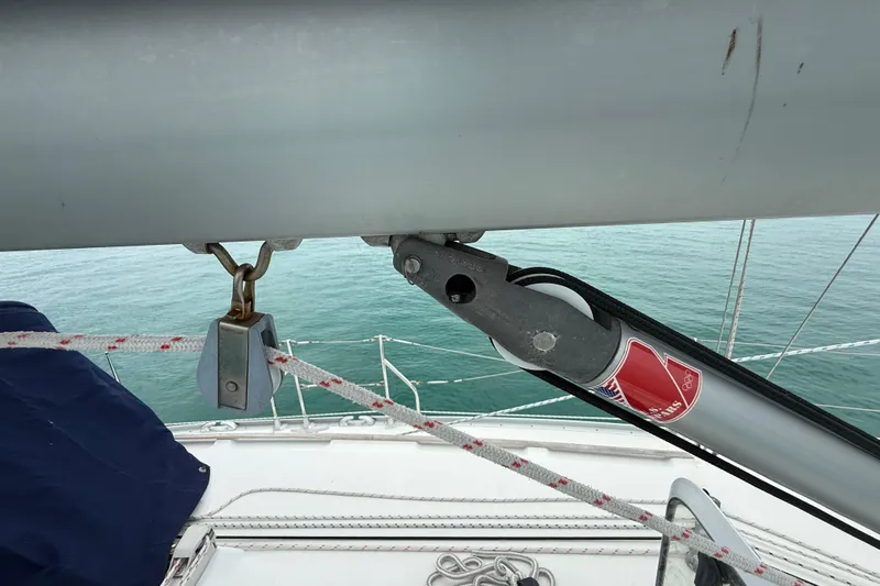 Slide: The Image of Close-up of Jeanneau Sun Odyssey 37 sailboat rigging, showcasing ropes and pulleys, 2003 model. - 25