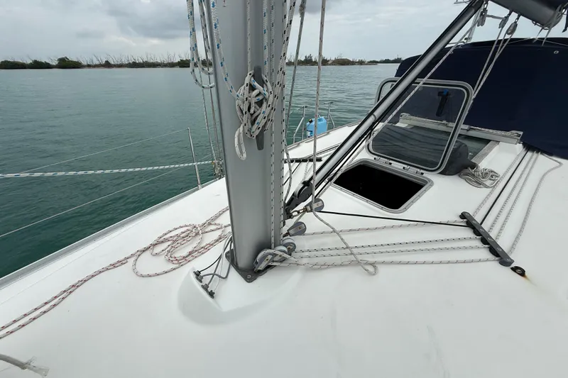 Slide: The Image of Deck of 2003 Jeanneau Sun Odyssey 37 sailboat with rigging and open hatch. - 33