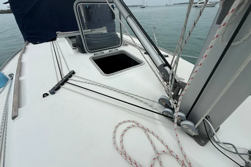 Slide: The Image of Deck of 2003 Jeanneau Sun Odyssey 37 sailboat with open hatch and rigging. - 35