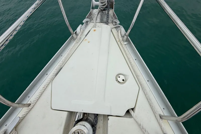 Slide: The Image of Bow of 2003 Jeanneau Sun Odyssey 37 sailboat with ropes and railing. - 41