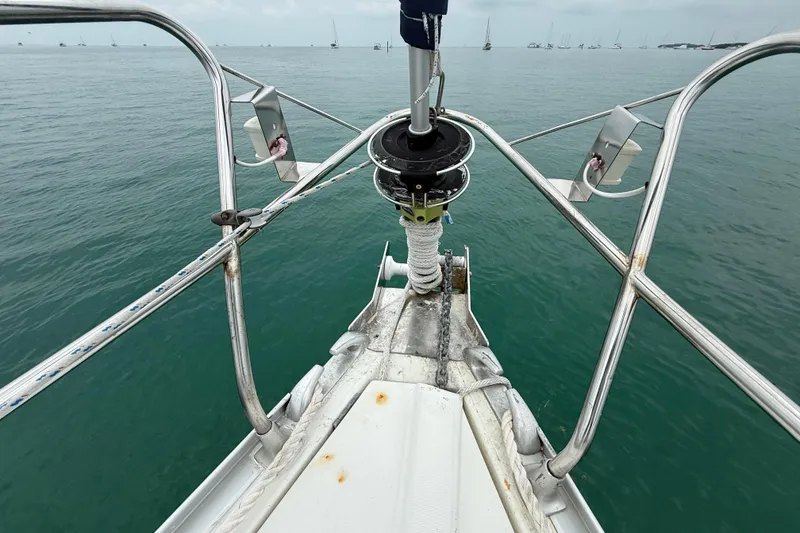 Slide: The Image of Bow view of 2003 Jeanneau Sun Odyssey 37 sailboat on calm sea. - 42