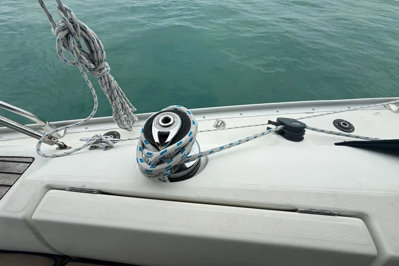 Slide: The Image of Deck of 2003 Jeanneau Sun Odyssey 37 sailboat with winch and ropes. - 48