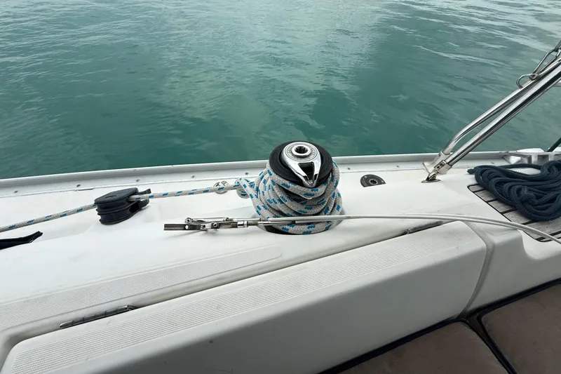 Slide: The Image of Deck of 2003 Jeanneau Sun Odyssey 37 with winch and ropes. - 50