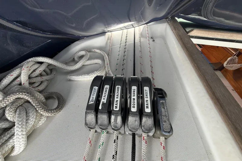 Slide: The Image of Sailing rigging controls on a 2003 Jeanneau Sun Odyssey 37 yacht deck. - 53