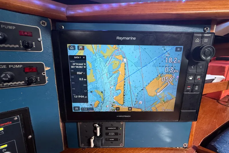 Slide: The Image of Raymarine navigation system on 2003 Jeanneau Sun Odyssey 37 sailboat, displaying nautical chart. - 56
