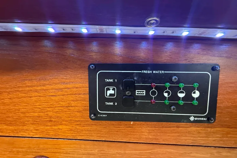Slide: The Image of Control panel for fresh water tanks on a 2003 Jeanneau Sun Odyssey 37 yacht. - 79