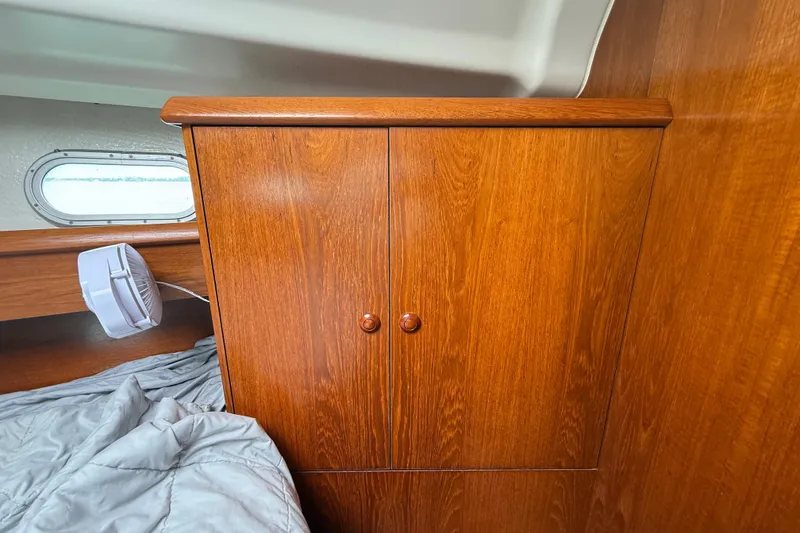 Slide: The Image of Wooden cabinet in 2003 Jeanneau Sun Odyssey 37 yacht interior. - 93