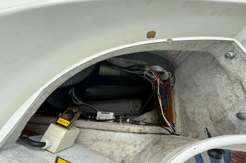 Slide: The Image of Electrical wiring and components inside a 2003 Jeanneau Sun Odyssey 37 yacht. - 99