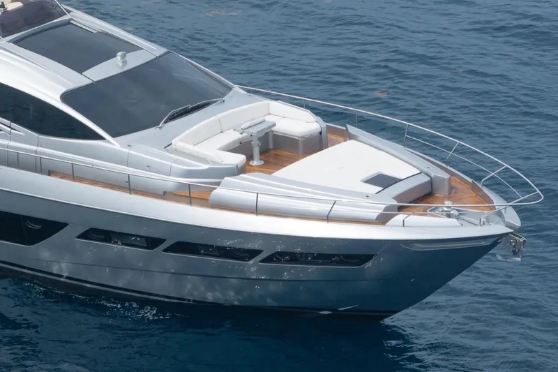Slide: The Image of Luxury 2020 Pershing 8X yacht cruising on blue ocean waters. - 10