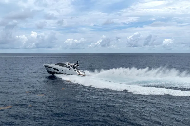 Slide: The Image of Luxury Pershing 8X yacht cruising on open sea under cloudy sky, 2020 model. - 17