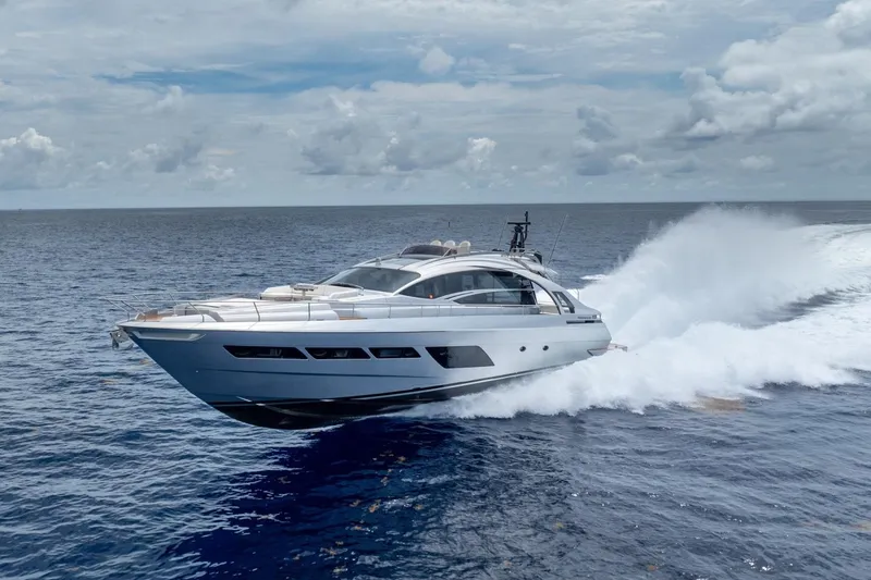Slide: The Image of 2020 Pershing 8X yacht cruising swiftly on open ocean waters. - 18