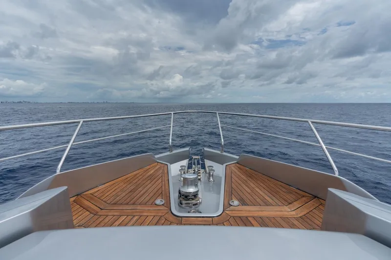 Slide: The Image of Bow view of 2020 Pershing 8X yacht on open sea under cloudy sky. - 30