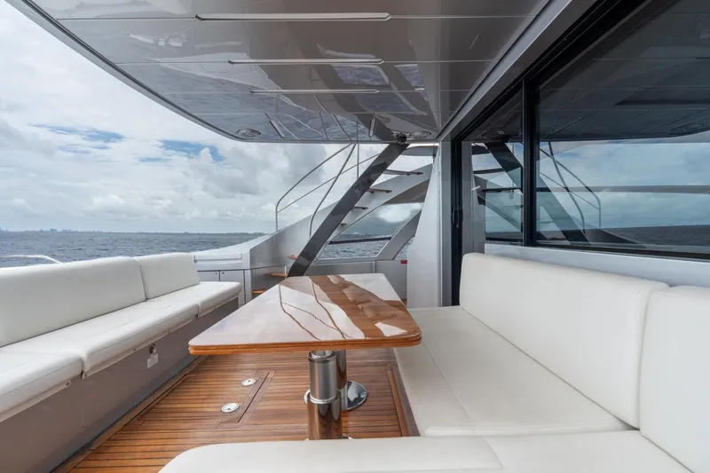 Slide: The Image of Luxury seating area on 2020 Pershing 8X yacht with ocean view. - 35