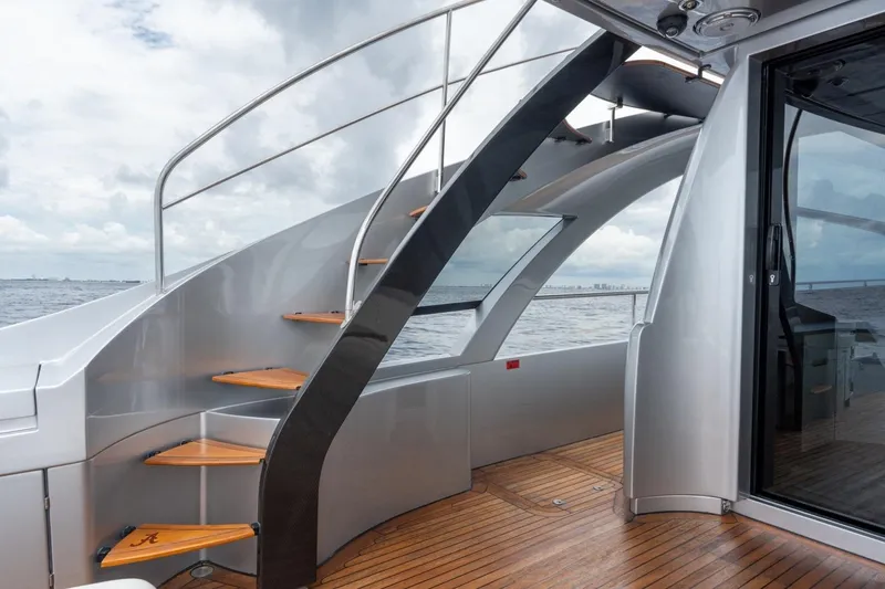Slide: The Image of Luxury Pershing 8X yacht staircase with sleek design and ocean view, 2020 model. - 37