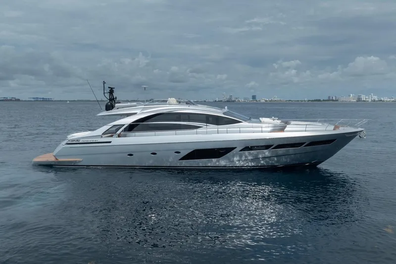 Slide: The Image of Luxury 2020 Pershing 8X yacht cruising on calm ocean waters. - 4