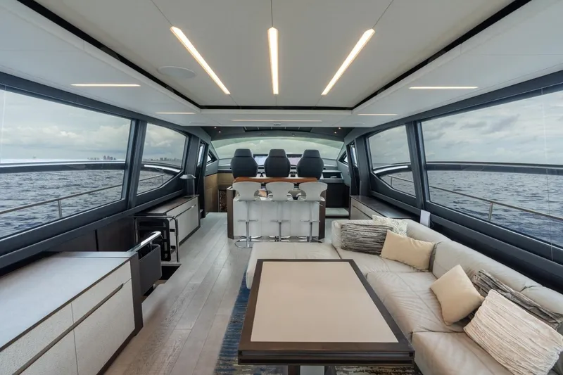 Slide: The Image of Luxurious interior of 2020 Pershing 8X yacht with panoramic ocean views. - 41
