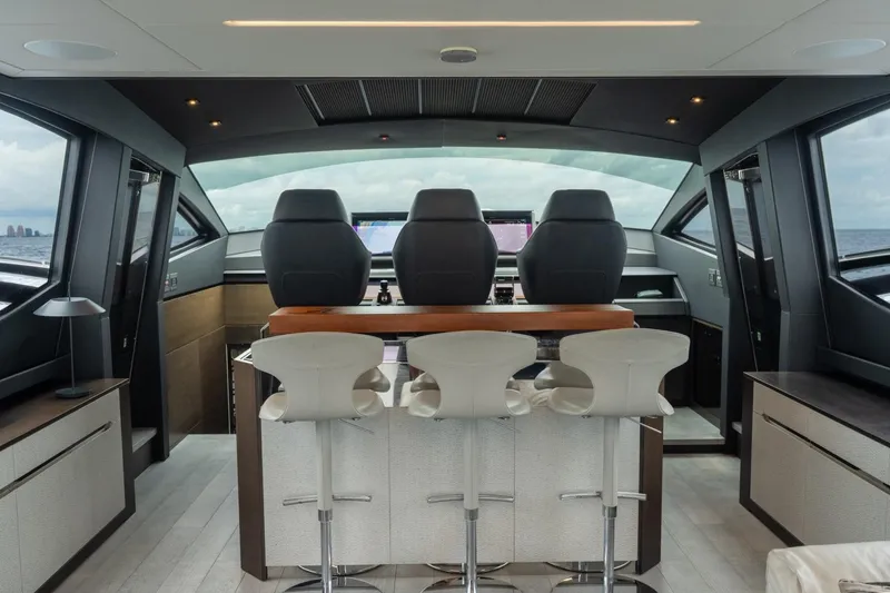 Slide: The Image of Luxurious interior of 2020 Pershing 8X yacht with modern helm and seating. - 42