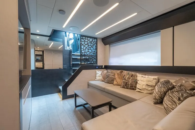 Slide: The Image of Luxurious interior of 2020 Pershing 8X yacht with modern seating and elegant decor. - 49