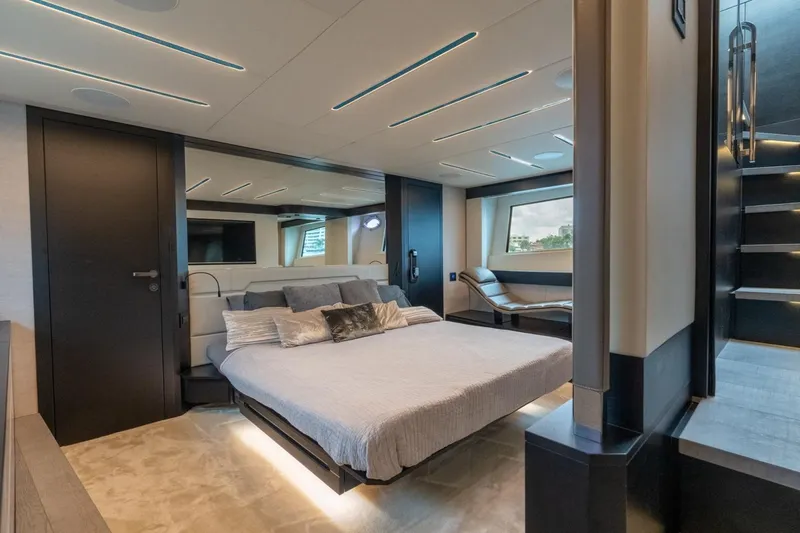 Slide: The Image of Luxurious bedroom interior of 2020 Pershing 8X yacht with modern design and elegant furnishings. - 54