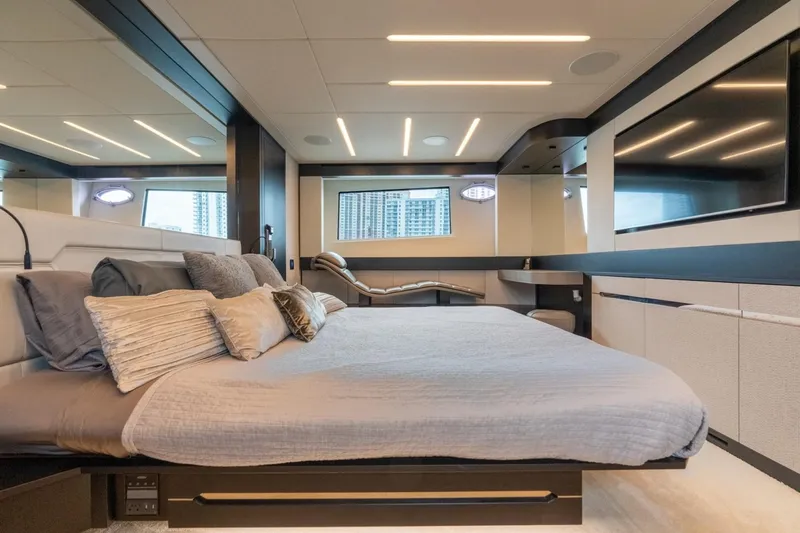 Slide: The Image of Luxurious bedroom interior of 2020 Pershing 8X yacht with modern design and elegant furnishings. - 55