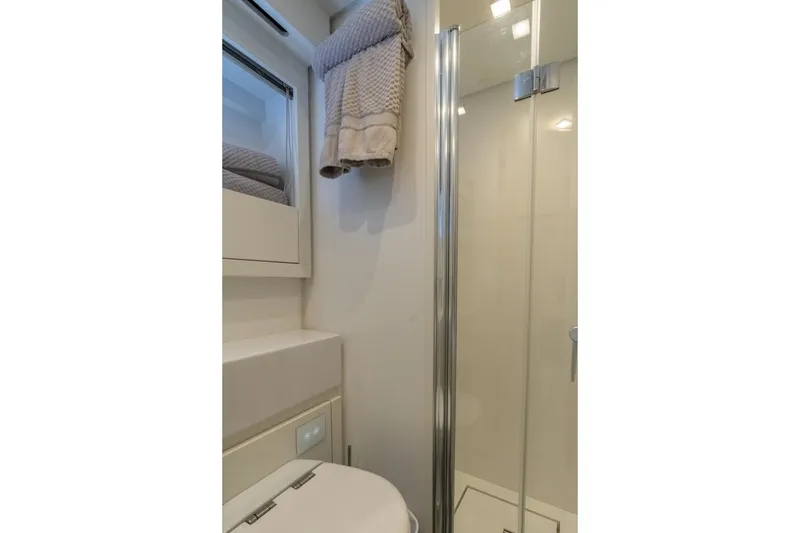 Slide: The Image of Luxurious bathroom in 2020 Pershing 8X yacht with modern shower and elegant design. - 65
