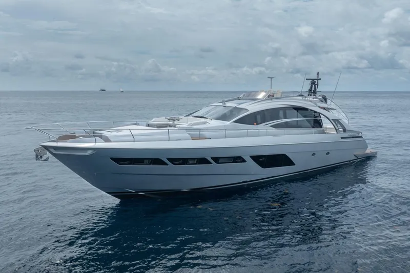 Slide: The Image of Luxury 2020 Pershing 8X yacht cruising on calm ocean waters. - 7