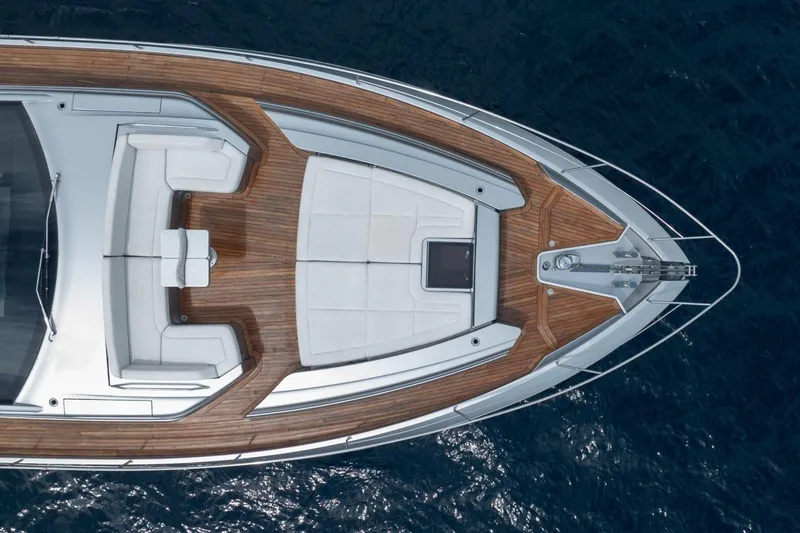 Slide: The Image of Aerial view of 2020 Pershing 8X yacht's sleek deck design on the ocean. - 8
