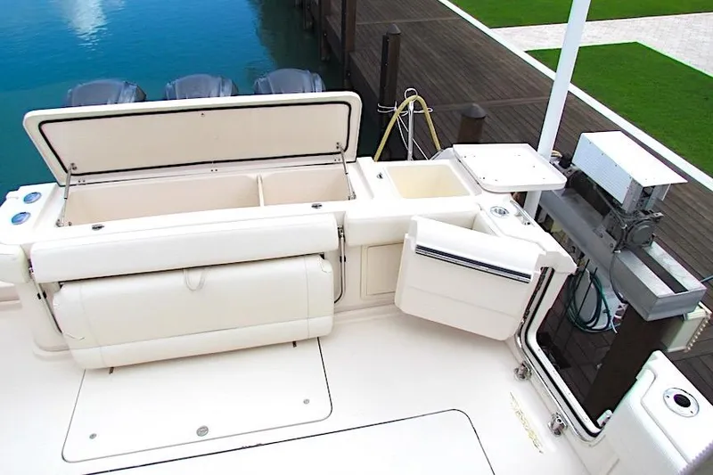 Slide: The Image of 2019 Grady-White Express 370 boat deck with open storage compartments. - 22