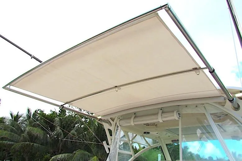Slide: The Image of 2019 Grady-White Express 370 boat canopy with tropical background. - 24