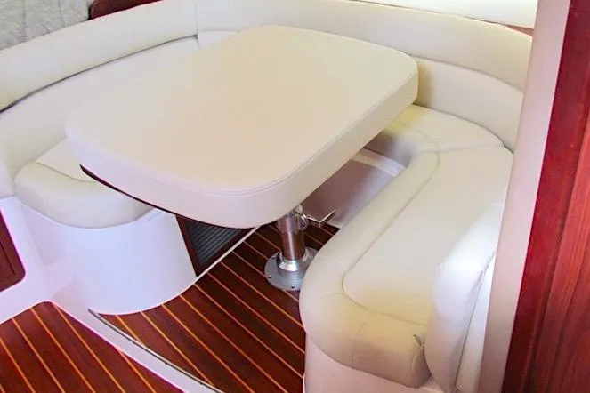 Slide: The Image of Luxurious seating area in 2019 Grady-White Express 370 boat with wooden flooring. - 36