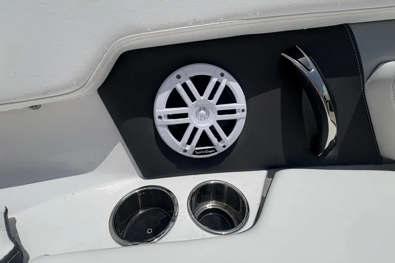Slide: The Image of 2024 Monterey M-205 boat interior with speaker and cup holders. - 13