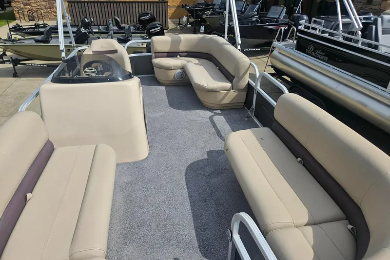 Slide: The Image of 2019 Sun Tracker Party Barge 18 DLX pontoon boat with spacious seating and modern design. - 2