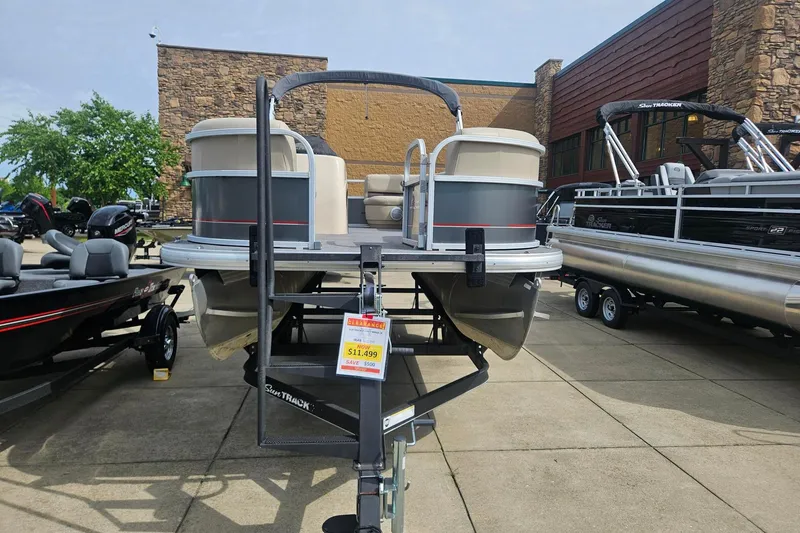 Slide: The Image of 2019 Sun Tracker Party Barge 18 DLX pontoon boat on display, priced at $11,499. - 3