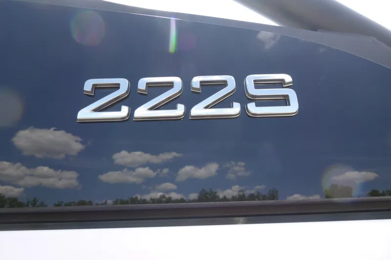 Slide: The Image of Yamaha Boats 2026 model 222S emblem with sky reflection. - 17